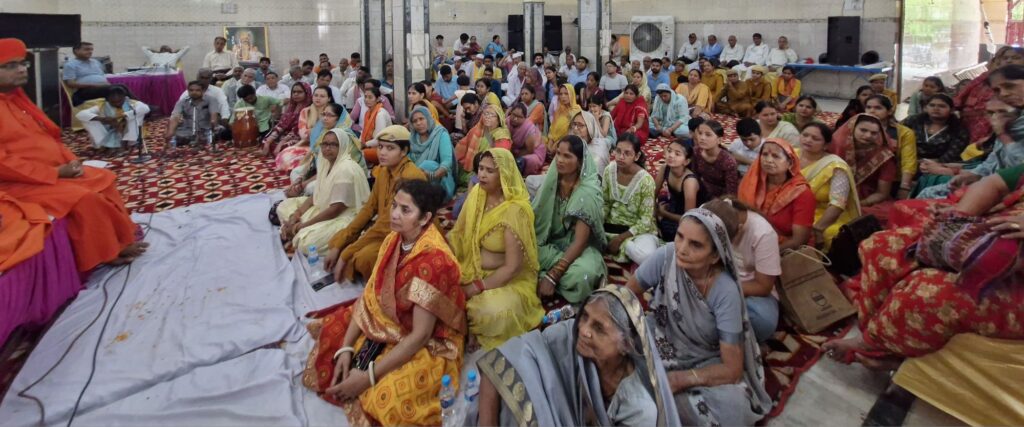 a group of people sitting on the floor
